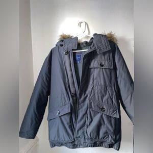 Gray heavy winter jacket for the cold weather. Kids size XL. Fits W/M size S